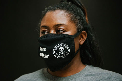 Woman wearing Death Wish 'Zero Filter' Face Covering