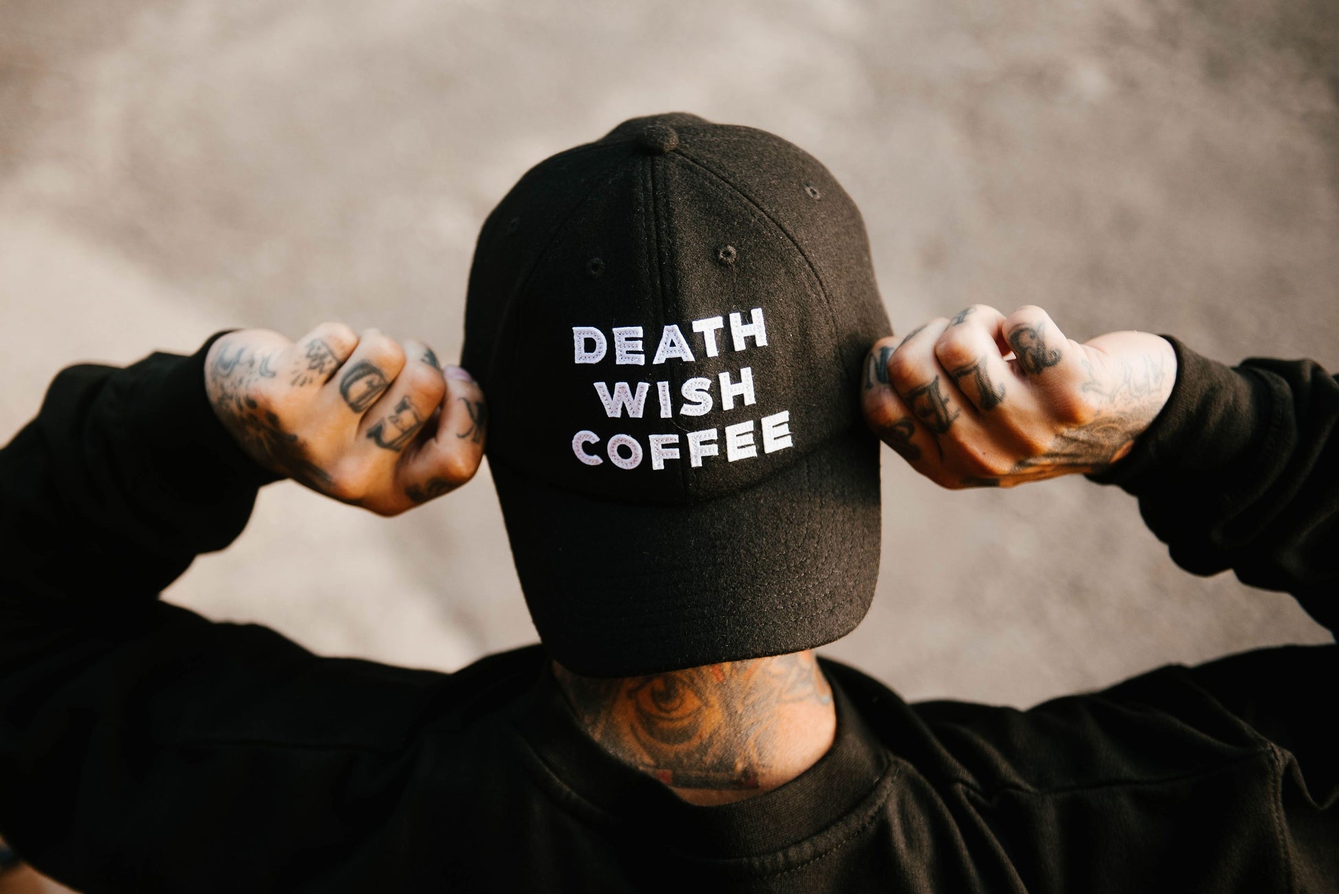 Back view of man wearing Death Wish Coffee Baseball Hat