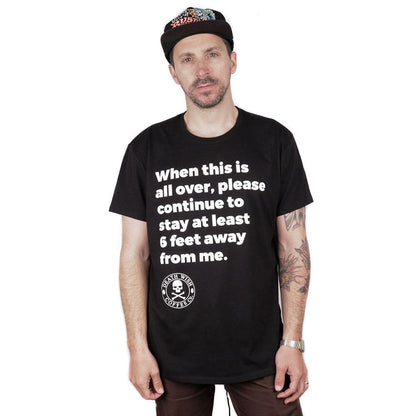 Man wearing "Broke, Not Busted" Charity T-shirt
