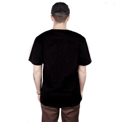 View from back of man wearing a "Broke, Not Busted" Charity T-shirt