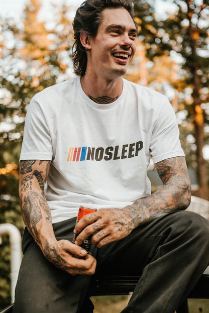 Man wearing a Nosleep T-Shirt while drinking Death Wish Coffee cold brew